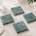 Green natural marble square coasters with white veining
