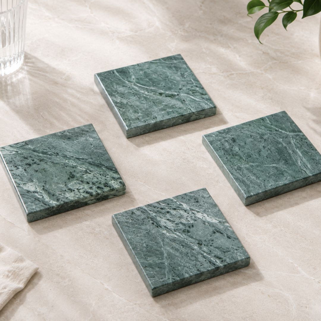 Green natural marble square coasters with white veining
