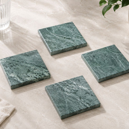 Green natural marble square coasters with white veining
