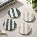  Round natural marble coasters with green white and beige marble stripes
