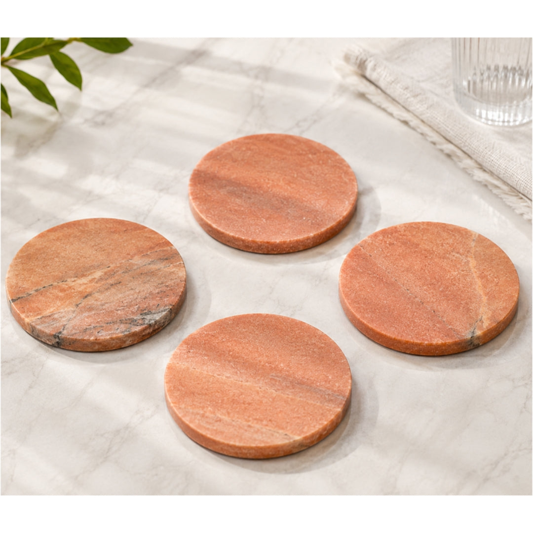 Natural red marble round coasters with grey veining
